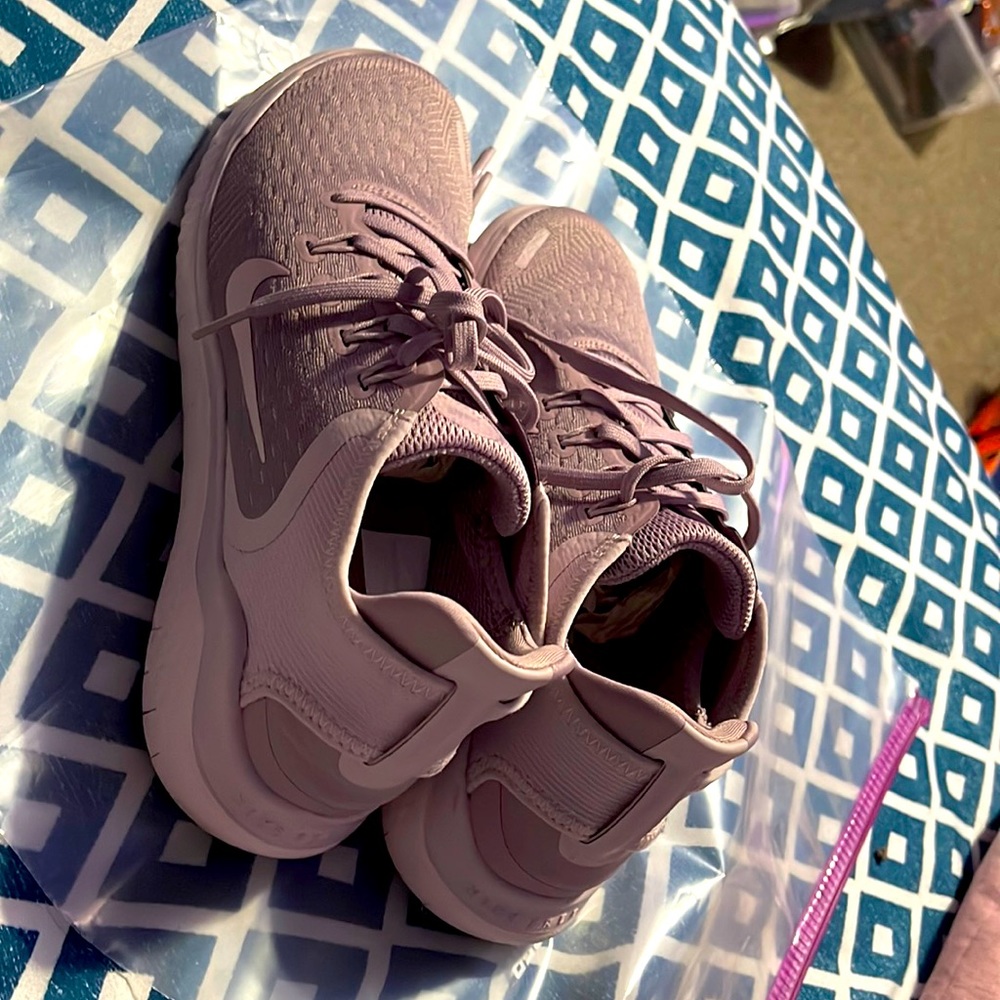 Worn twice but still in good condition Nike Free Run in mauve/blush pink